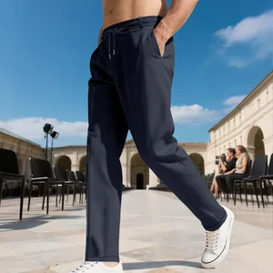 Primer plano de pantalones de vestir rectos azul marino con cordón en la cintura en modelo