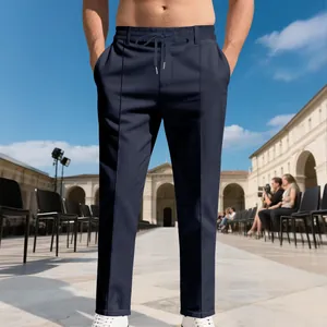 Vista detallada de pantalones de negocios azul marino con cordón elástico en cintura