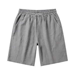 Detailed view of grey linen men's casual shorts featuring drawstring and elastic waist.