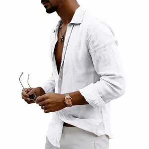 Detail view of men's white linen long sleeve shirt with breathable summer texture.