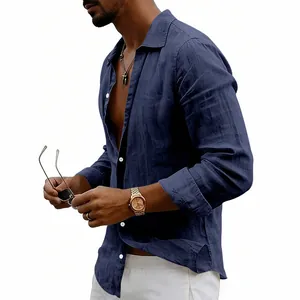 Macro view of navy blue long sleeve linen shirt featuring vintage lapel and white buttons.