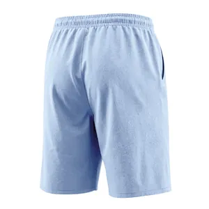 Detailed back view of men's light blue linen blend shorts featuring elastic waistband