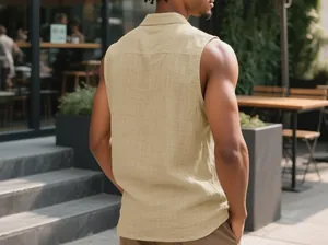 Back view detail of a khaki linen sleeveless shirt for men in an outdoor cafe setting