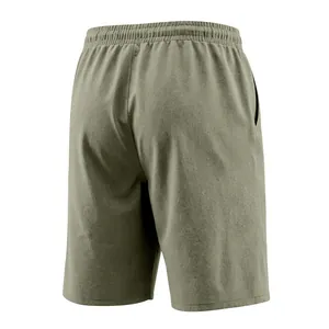 Detailed back view of men's casual olive green linen shorts featuring a comfortable elastic waist