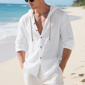 Close-up of white linen hooded shirt texture and button design on male beach model