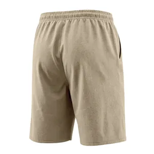 Back view of men's beige casual linen shorts with comfortable elastic waistband.