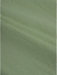 Detailed close-up view of breathable sage green cotton linen blend fabric texture