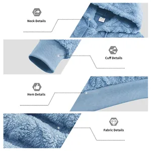 Détails du sweat à capuche en polaire bleue : col, poignets, ourlet et texture du tissu.