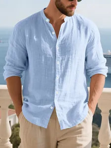 Men's casual light blue linen Henley shirt featuring a stand collar and long sleeves.