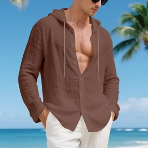 Casual brown linen hooded shirt for men with long sleeves and buttons on beach background