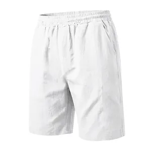 Detail of breathable white cotton linen men's casual beach shorts with drawstring