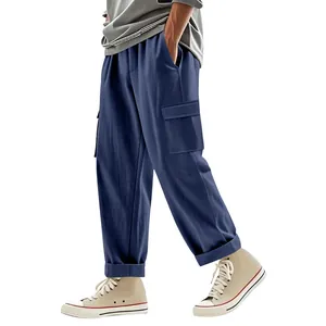 Loose fit navy blue linen cargo pants for men featuring functional multi-pockets
