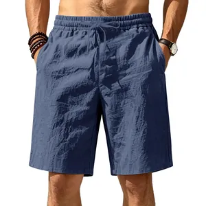Close-up detail of men's blue linen casual beach shorts with elastic waist and drawstring