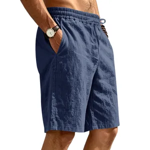 Detailed view of men's loose blue linen casual shorts featuring a drawstring waist