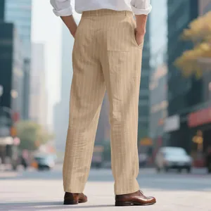 Back view of men's beige striped linen straight-leg trousers in an urban setting