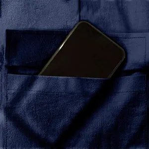Detailed close-up view of a deep pocket on navy blue men's breathable linen cargo pants