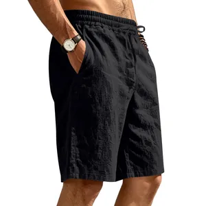 Detailed view of breathable black linen shorts for men with elastic drawstring waist