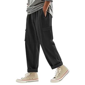 Men's breathable black linen cargo pants with loose fit and multi-pocket design