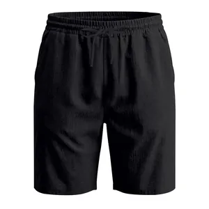 Detailed view of men's loose breathable black linen casual beach shorts with drawstring