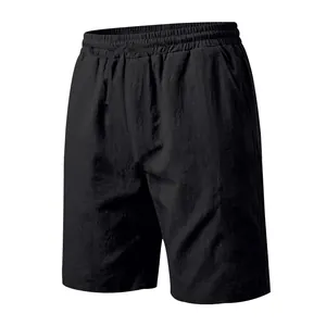 Detailed view of men's black linen casual shorts with drawstring waist and pockets