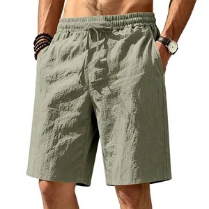 Close-up of olive green breathable linen cotton texture on men's casual beach shorts