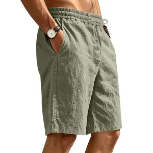 Detail view showing the olive green texture of men's linen loose fit casual beach shorts