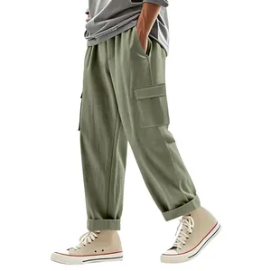 Relaxed fit olive green linen cargo pants for men featuring large side pockets