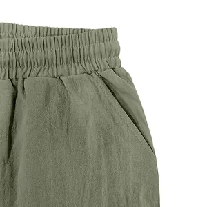 Close-up of elastic waistband and pocket on men's breathable linen casual pants