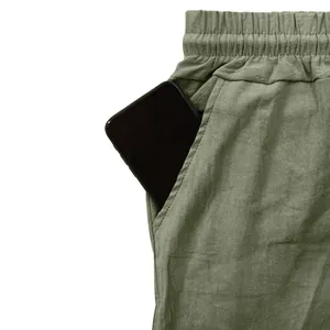 Close-up detail of functional side pocket on men's breathable linen casual pants