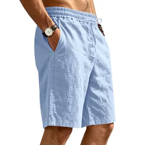 Detail view of men's breathable light blue linen shorts with drawstring waist