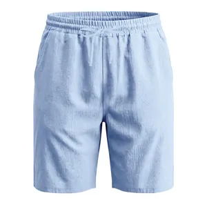 Front view of light blue breathable men's linen beach shorts with drawstring waist.