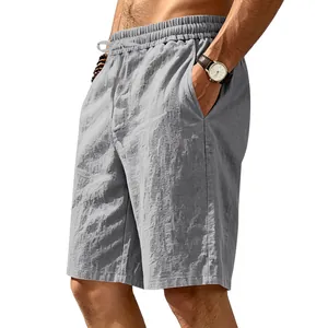 Detailed texture of men's breathable linen grey beach shorts with drawstring elastic waist.