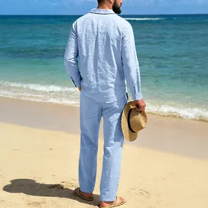 Back view showing the relaxed fit of a light blue linen beach shirt and pants set