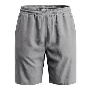 Detail view of grey linen blend men's casual shorts with elastic drawstring waist.