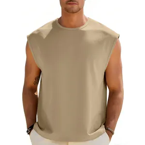 Detail view of khaki sleeveless T-shirt showing round neck and loose fit texture