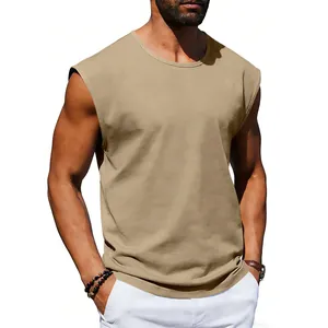 Close-up detail of men's loose fit crew neck sleeveless T-shirt in khaki sand color