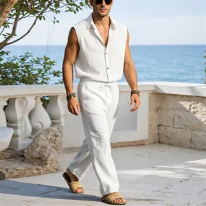 Elegant white men's sleeveless linen shirt and drawstring pants set for a stylish beach vacation
