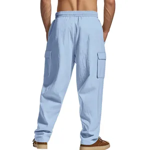 Rear view showing details of light blue men's loose cargo pants with elastic waist