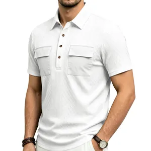 Close-up of white jacquard polo shirt with dual chest pockets and textured pattern