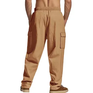 Rear view of men's loose breathable khaki linen cargo pants featuring large side pockets
