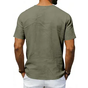 Back view of men's olive green linen short-sleeved shirt with white pants