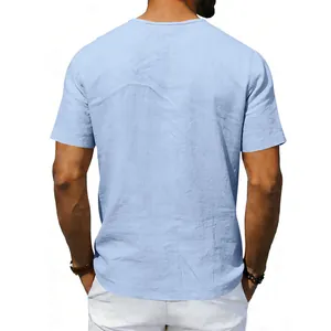 Back view of a men's light blue short-sleeve linen shirt showing fabric texture and fit