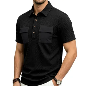 Close-up of black men's jacquard polo shirt showing pockets and textured fabric