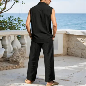 Back view of men's black sleeveless linen shirt and matching casual pants resort wear set