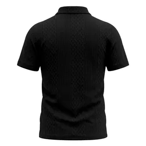 Back view of a black men's short sleeve polo shirt with textured jacquard pattern