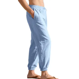 Side view of men's light blue breathable linen jogger pants with pockets