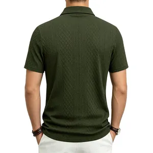 Detailed back view of a men's dark green jacquard knit polo shirt with textured pattern.