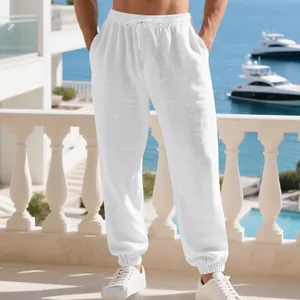 White breathable linen beach pants for men featuring drawstring waist and jogger cuffs