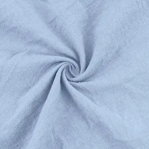 Macro detail of light blue breathable linen-cotton fabric texture with weave