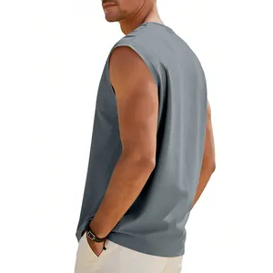 Side view detail of a loose fit grey sleeveless tank top for men in casual style.